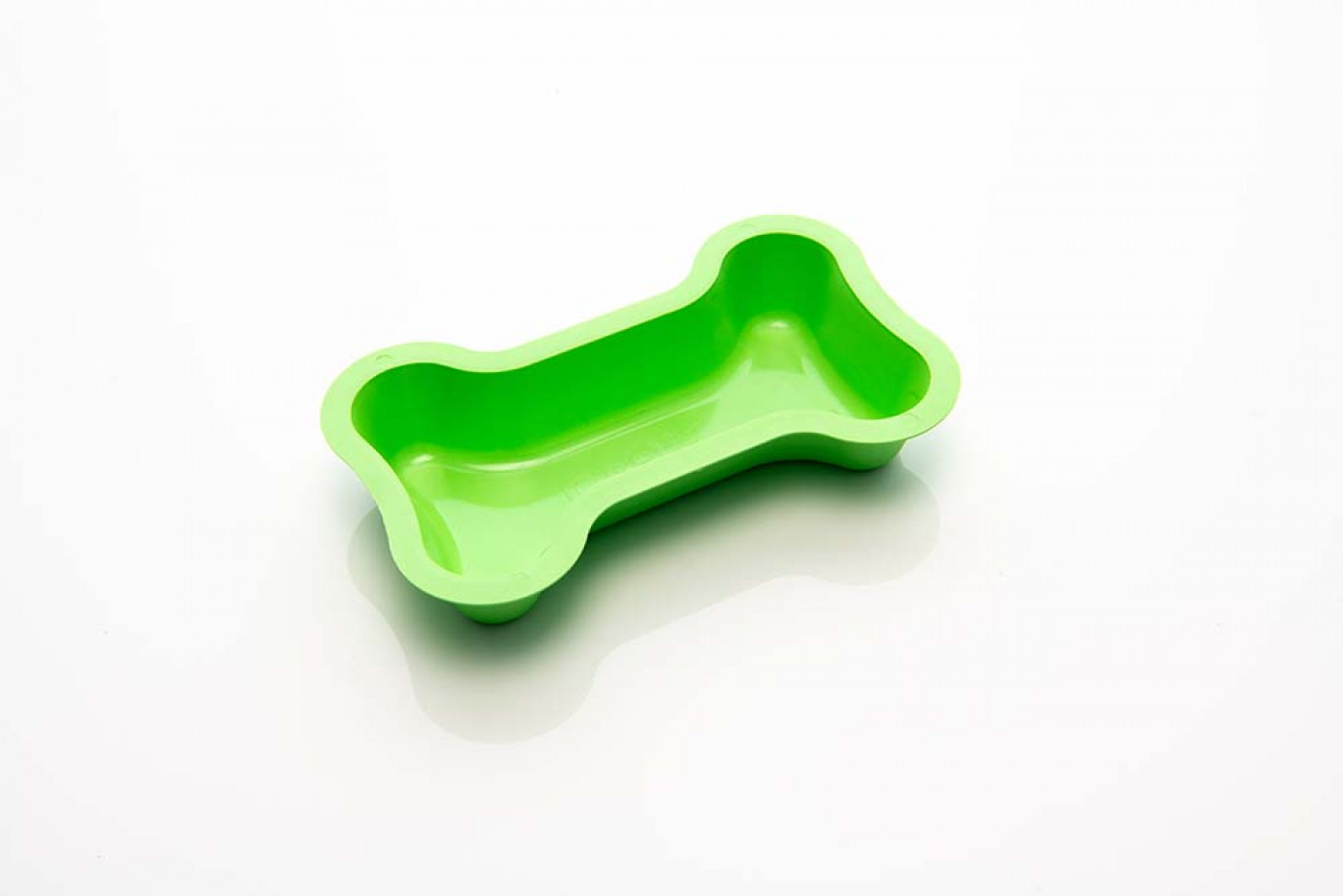Green bone shaped dog bowl made out of Terralene®